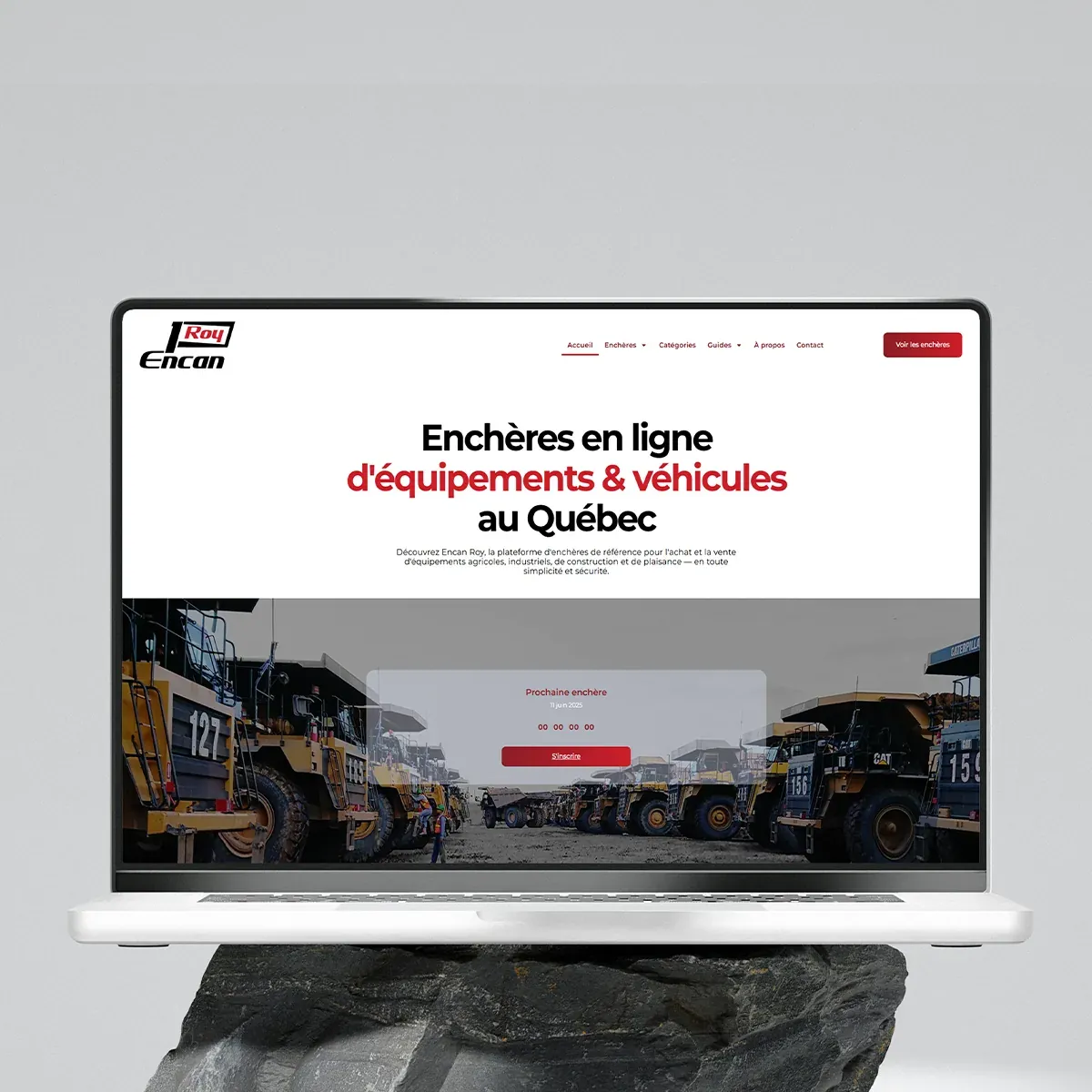 Encan Roy website by Digital TEN X on a laptop: online auctions of equipment and vehicles in Québec