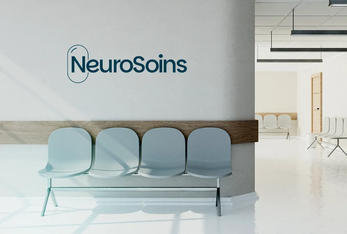 NeuroSoins wordmark on a clinic waiting-room wall